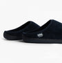 Totes Isotoner SWEPT BACK POPCORN MULE Mens Mule Slippers Navy side view showcasing soft textured upper and slip-on design.