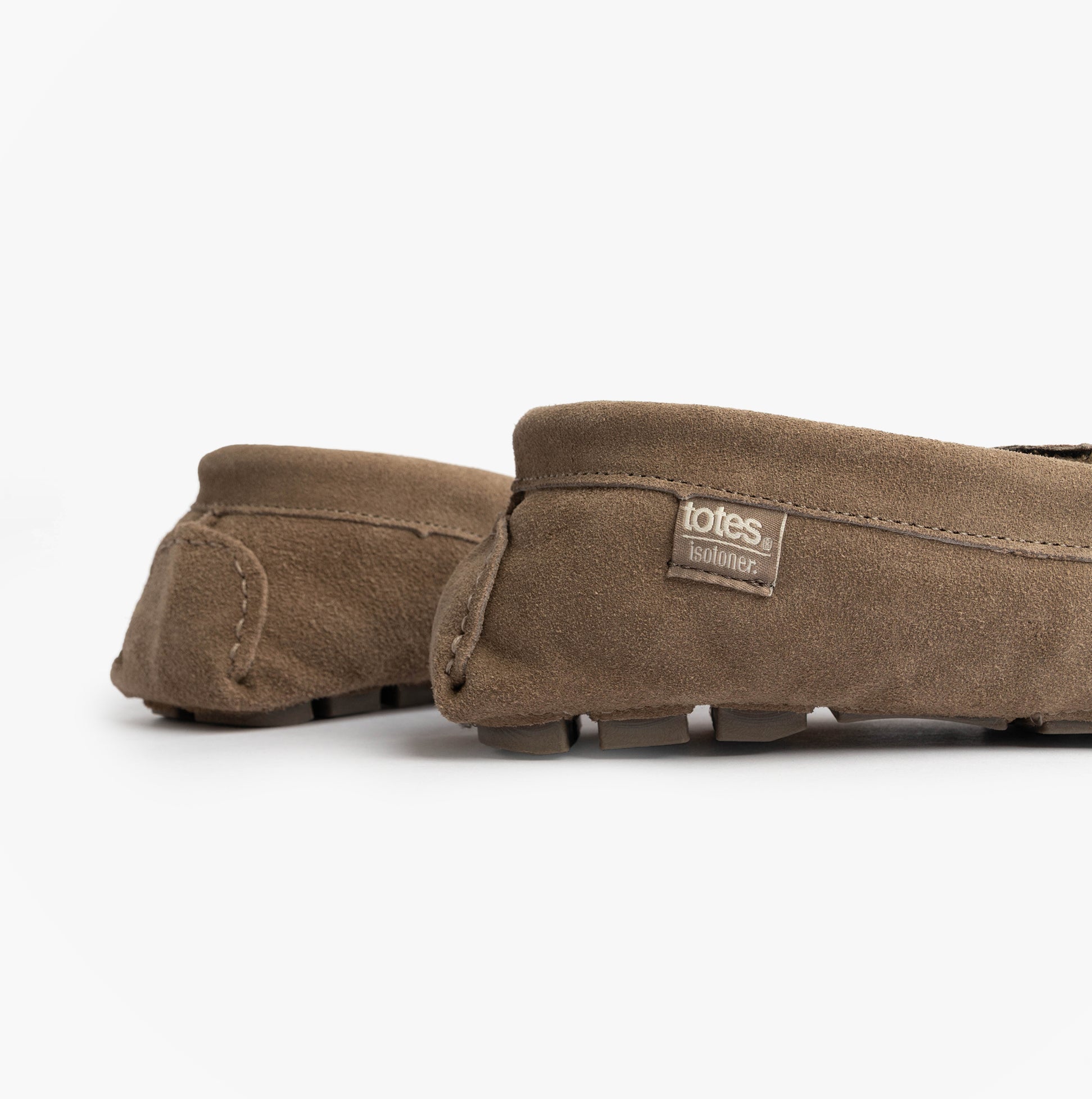 Totes Isotoner SUEDE CLASSIC Moccasin Slippers Mens Sand side view showing soft suede material and round toe design.