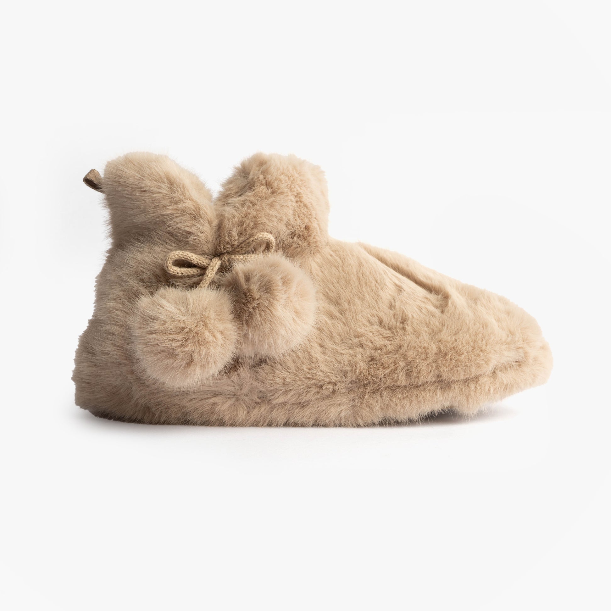 Totes Toasties FAUX FUR Boot Slippers Womens Oat side view showing soft faux fur and pom pom detail