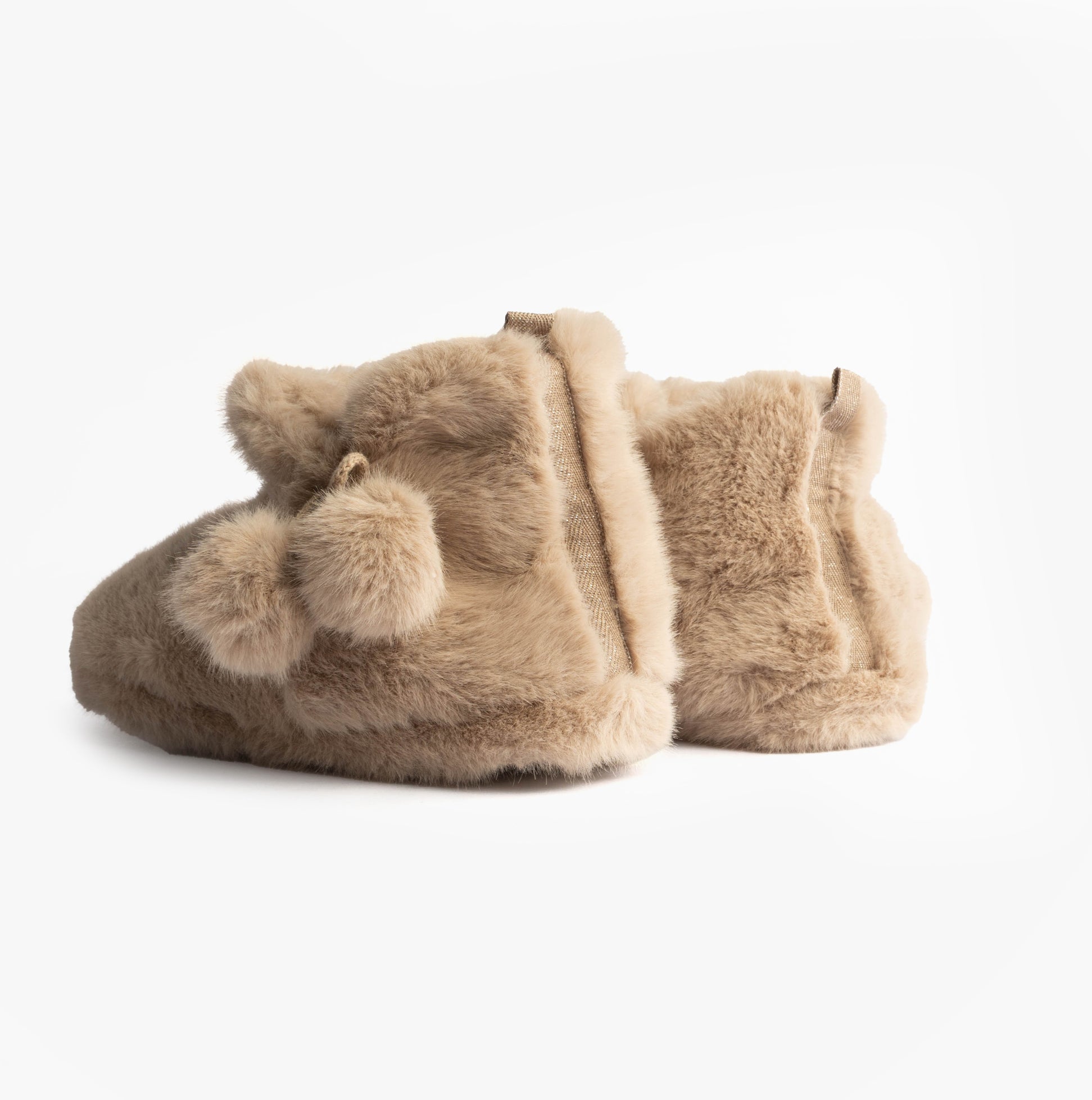 Totes Toasties FAUX FUR Boot Slippers Womens Oat side view showcasing plush faux fur and pom poms.