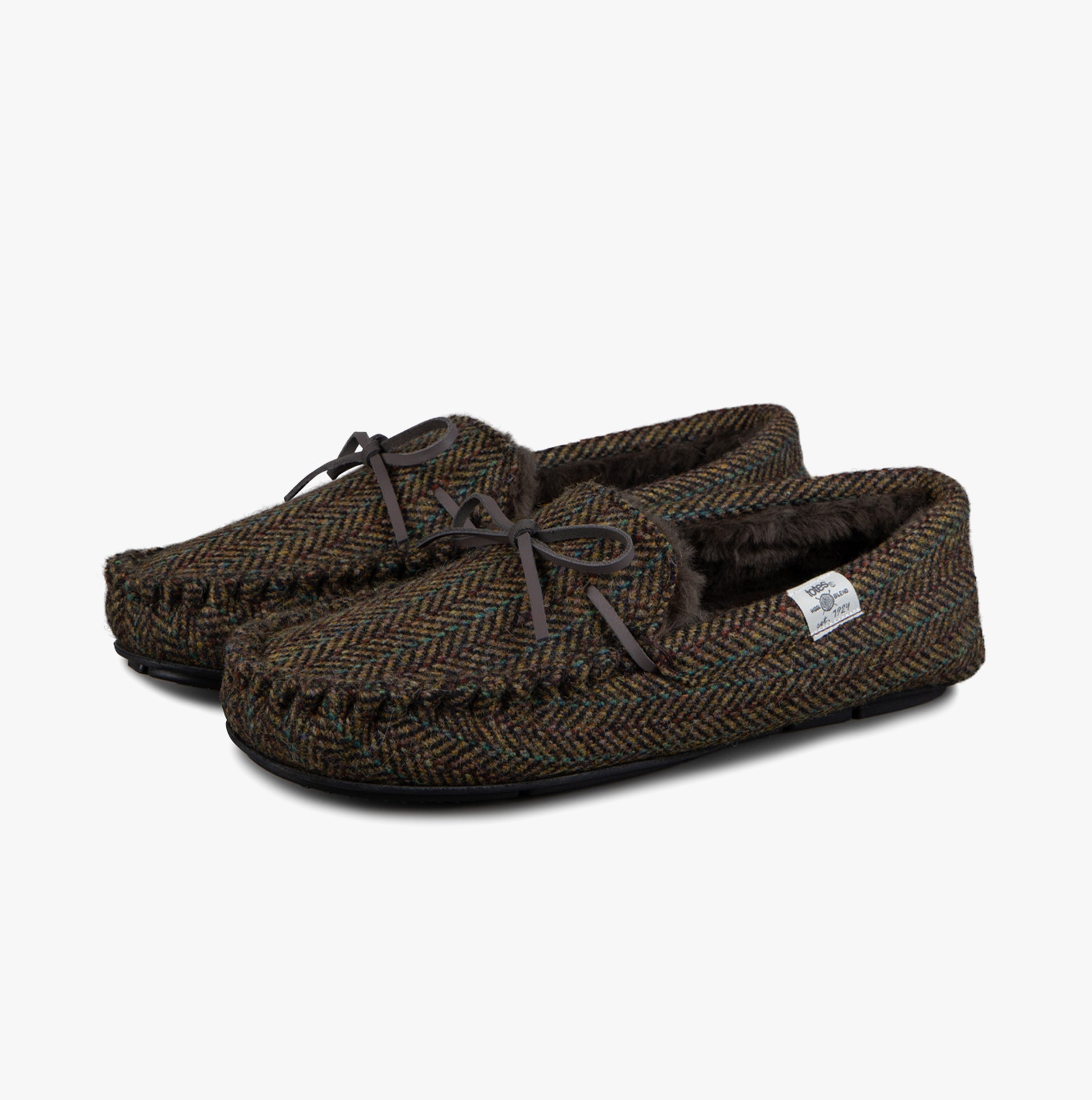 Totes Toasties WOVEN WOOL MIX MOCCASIN Slippers Mens Brown side view showing cozy design and herringbone pattern.