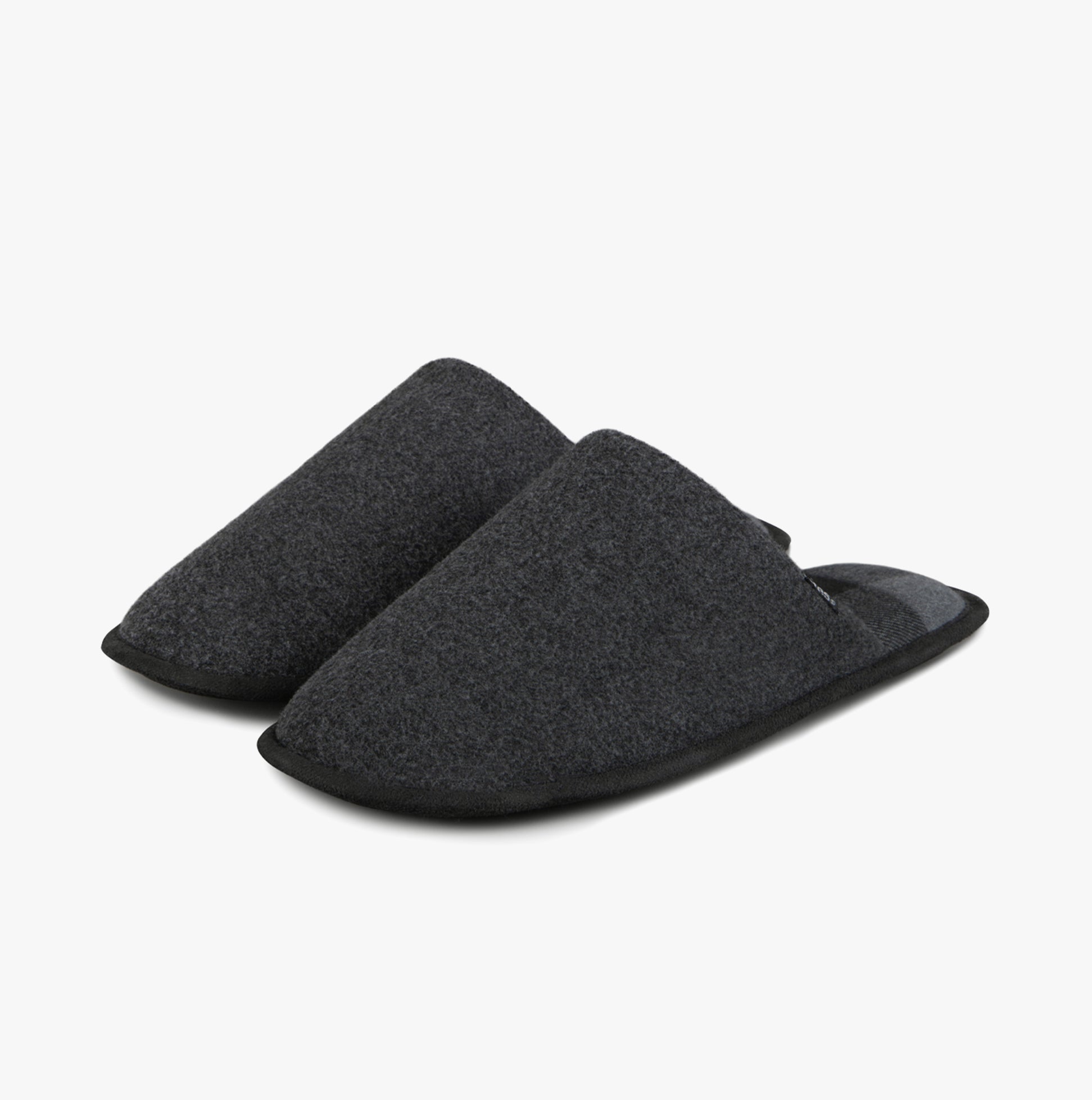 Totes Toasties JERSEY MULE Slippers WITH CHECK LINING Mens Charcoal side view of slippers in dark gray textile.