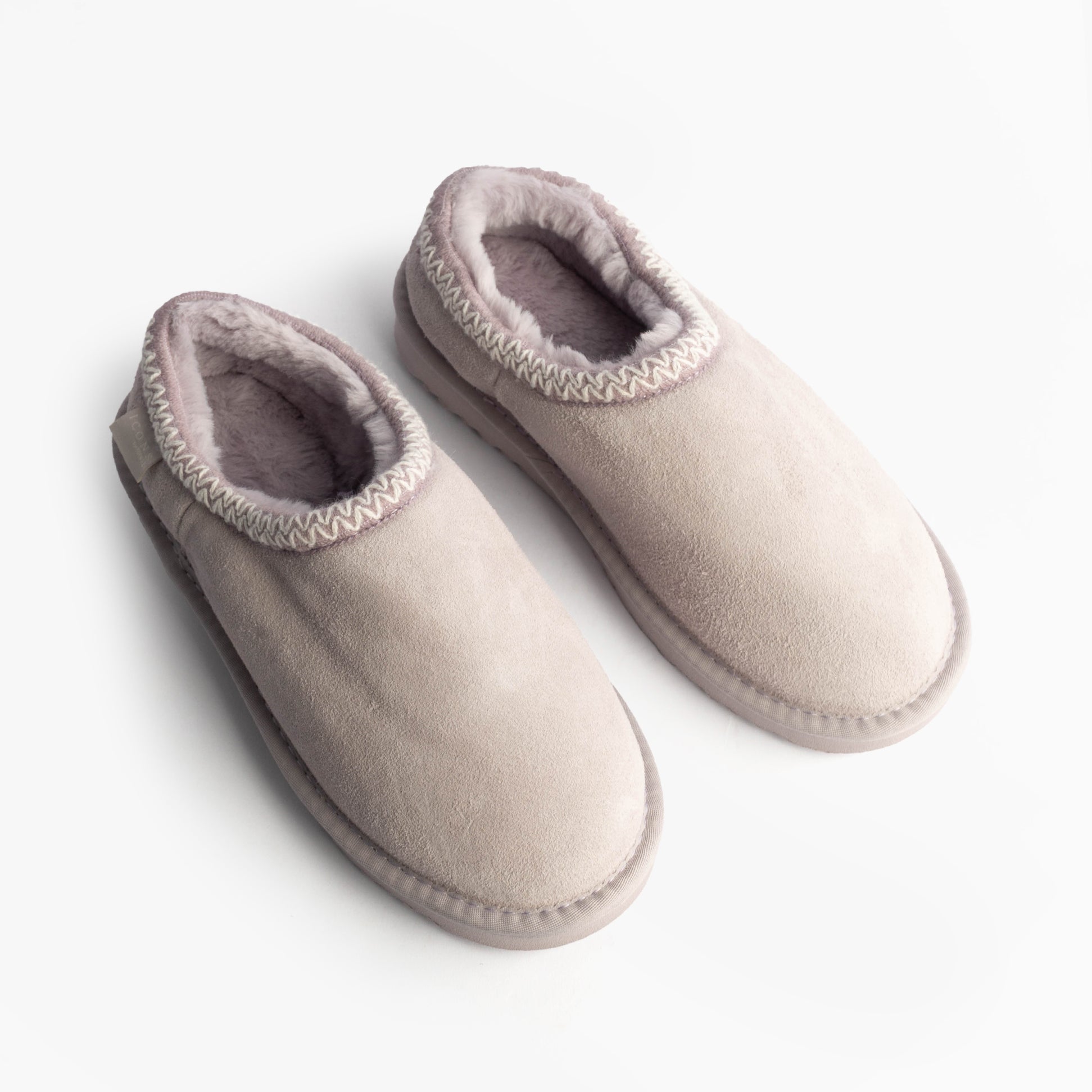 Totes Toasties ICONS SUEDE Shoot Slippers Womens Lilac top view showing suede material and soft lining.