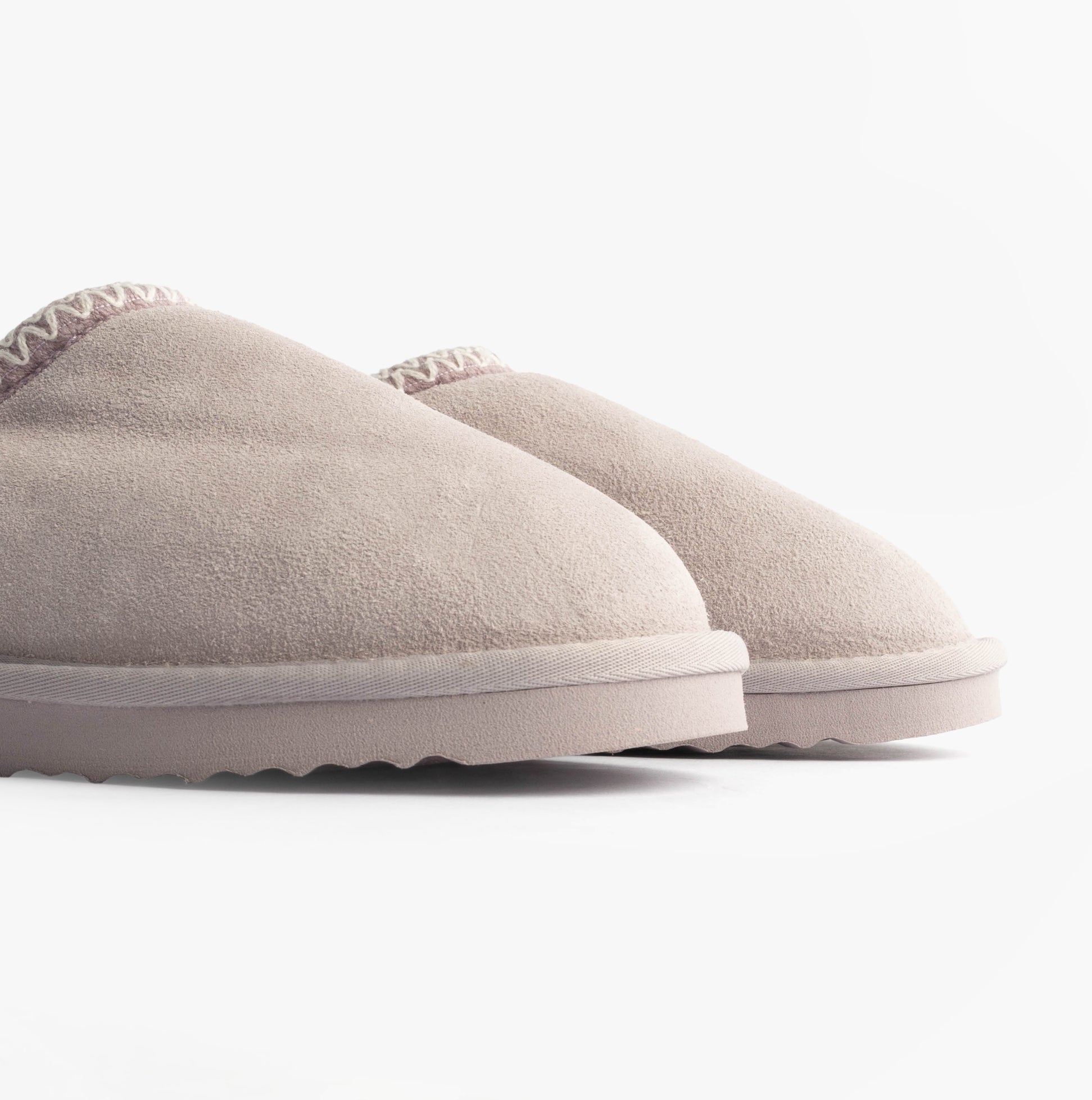 Totes Toasties ICONS SUEDE Shoot Slippers Womens Lilac side view showcasing soft suede upper and round toe shape.