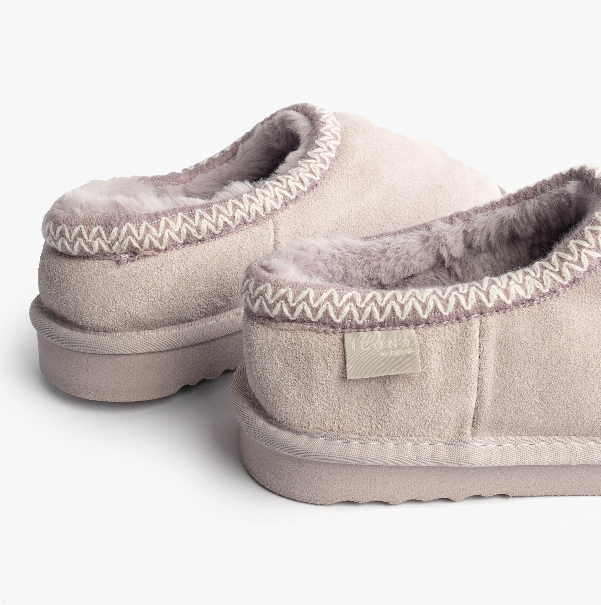 Totes Toasties ICONS SUEDE Shoot Slippers Womens Lilac side view showing soft suede upper and warm lining details.