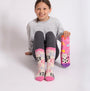 Totes Toasties ORIGINAL SLIPPER-SOX (TWIN PACK) Kids Cat With Flower, girl wearing socks with flower design, front view.