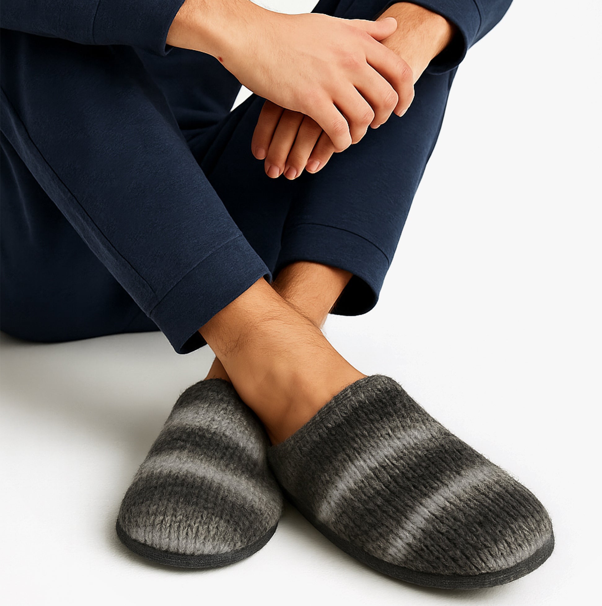 Totes Toasties KNITTED OMBRE Mule Slippers Mens Grey side view worn with navy outfit, highlighting the grey and black ombre design.