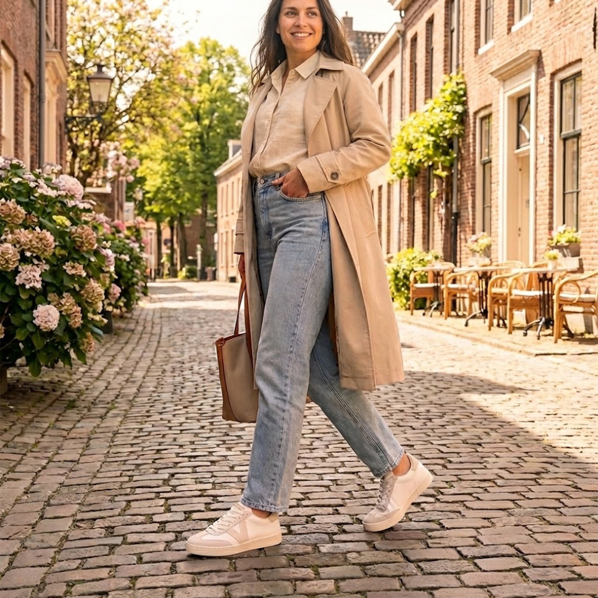 Victoria BERLIN Womens Trainers Hielo side view on a woman walking in a sunny street with flowers.