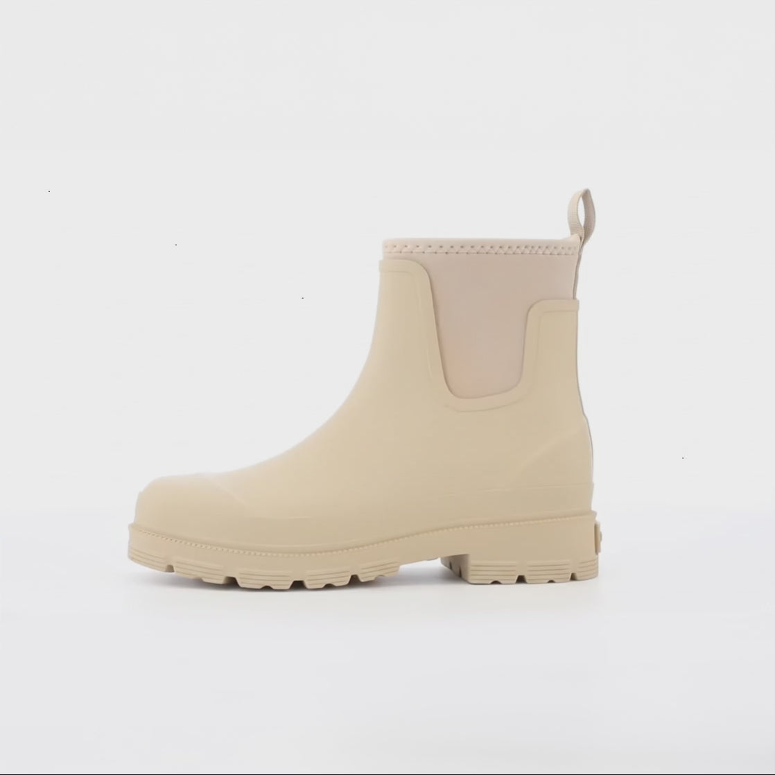 Mud Dogs BROOKE Womens Ankle Neoprene Wellies Mushroom side view, beige rubber and neoprene ankle boots with pull-on design.