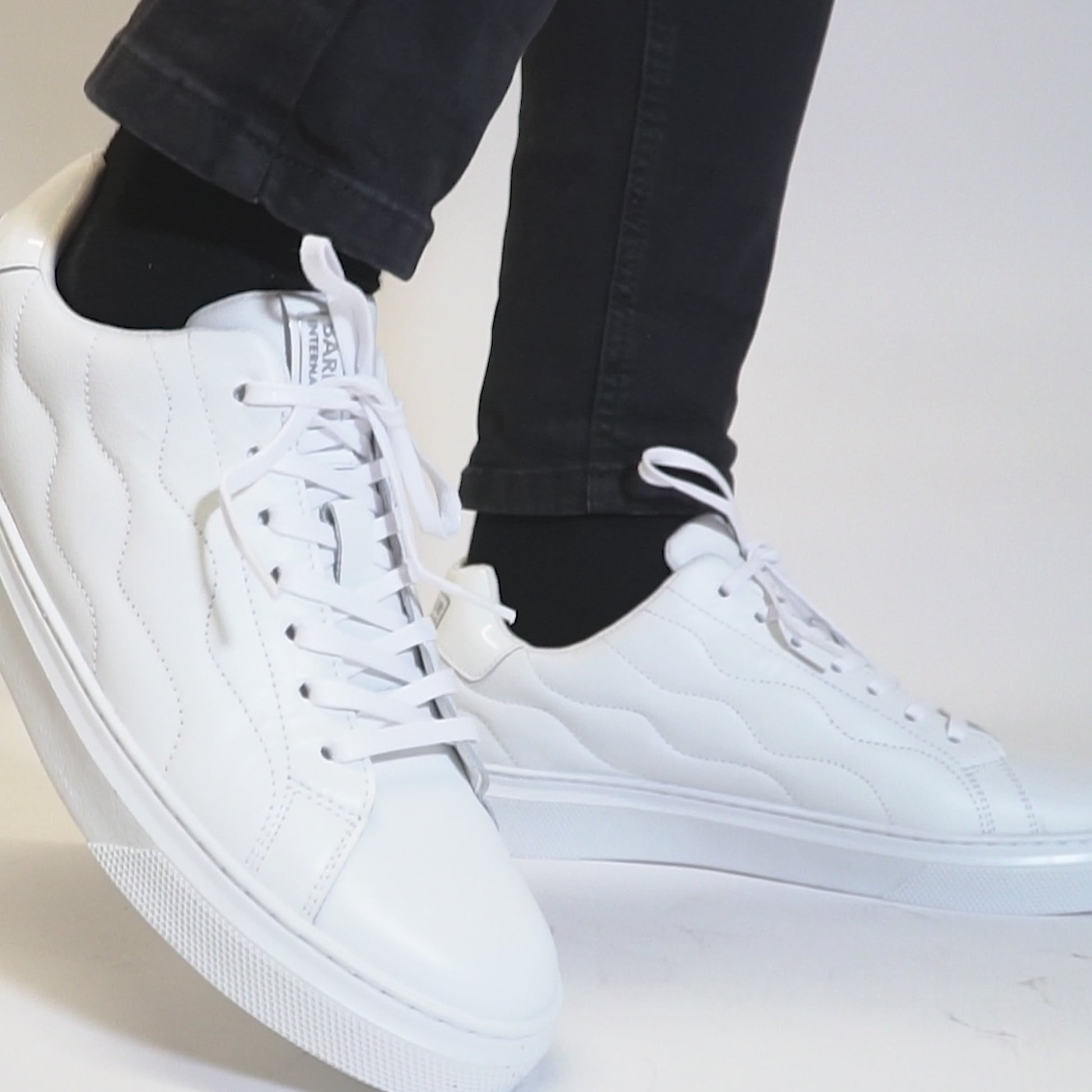 Barbour GLENDALE Mens Trainers White side view showing sleek leather upper and round toe design.